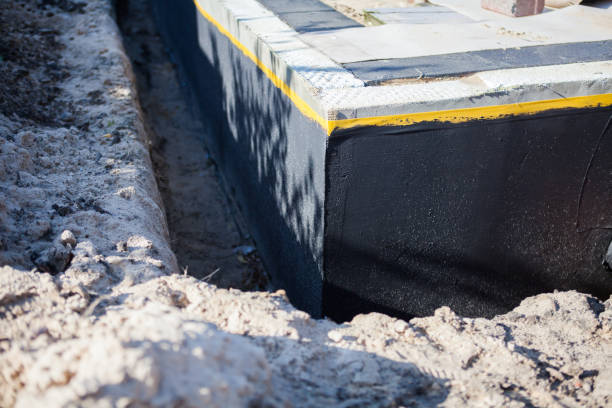Professional Waterproofing technician working in Waterloo, IL